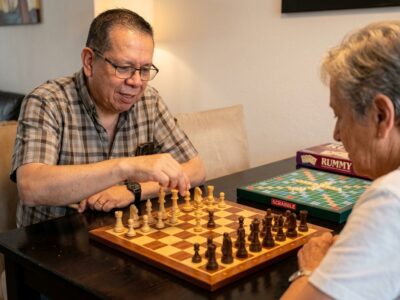 Two_adults_playing_chess_20260917021346
